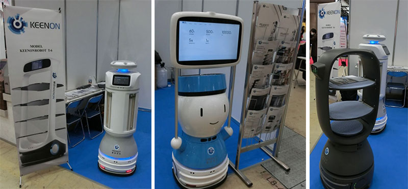 写真4.自律走行型ロボット（左：消毒ロボット、中央：案内ロボット、右：配膳ロボット）